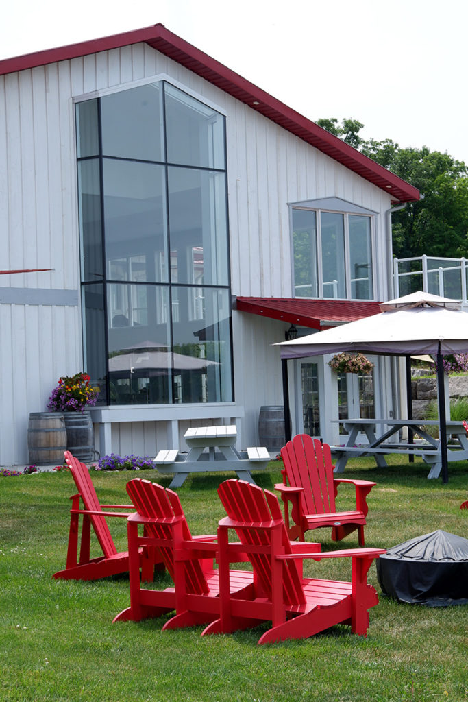 A guide to the Twenty Valley wine region: Kacaba vineyards outdoor seating area with red chairs 