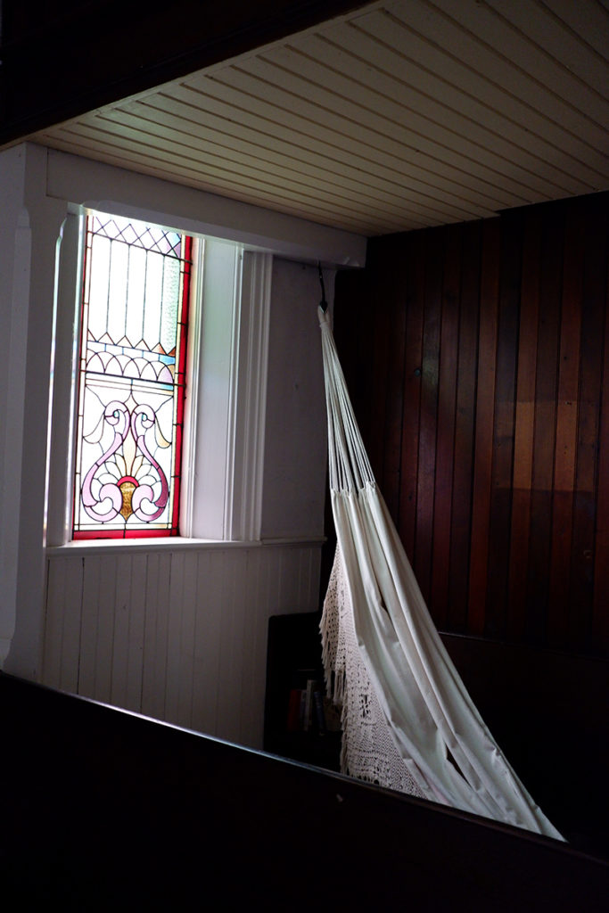 Finding ways to release the pandemic-related apathy in small stride: hammock in the shade of room corner 