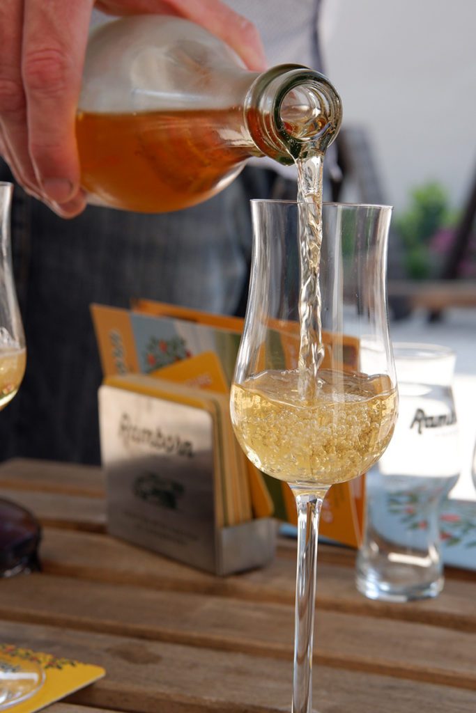 The views & flavours of the Luxembourg wine country: cider being poured into a glass 