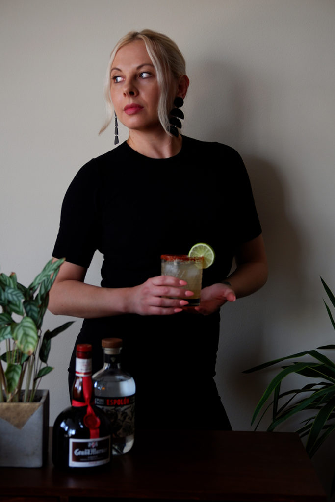 Kateryna Topol photo portfolio: Grand Marnier Global instagram ad with a woman dressed in black holding a margarita 