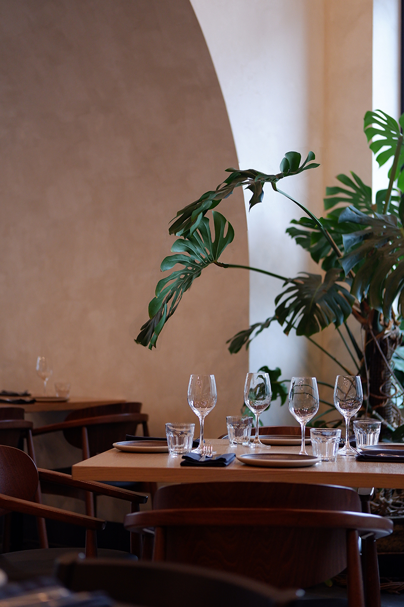 Fonda Fora restaurant, table set with wine glasses 