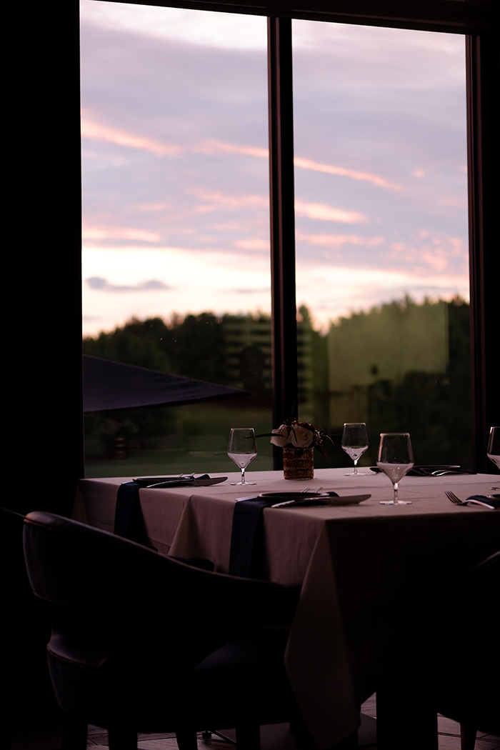 Postcards from Selkirk: Big Pete's Steakhouse, an image of the dining table in front of the window at dawn