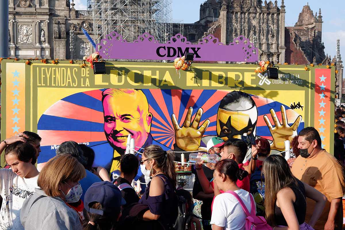 The ofrenda for Mexico City featuring a lucha libre stage