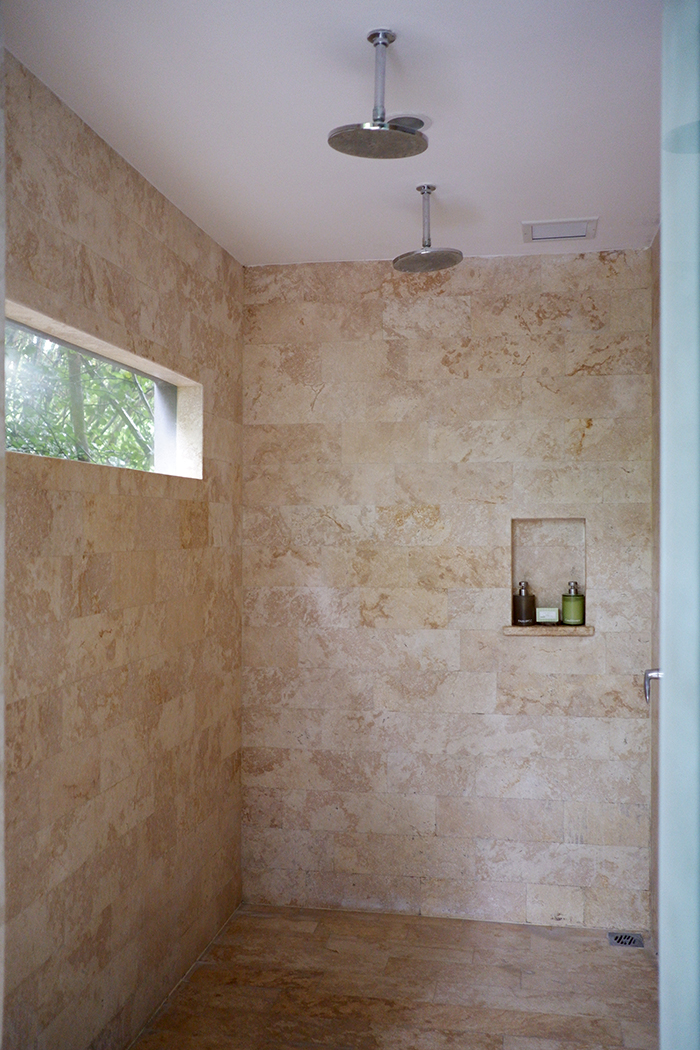 walk-in shower with two shower heads 