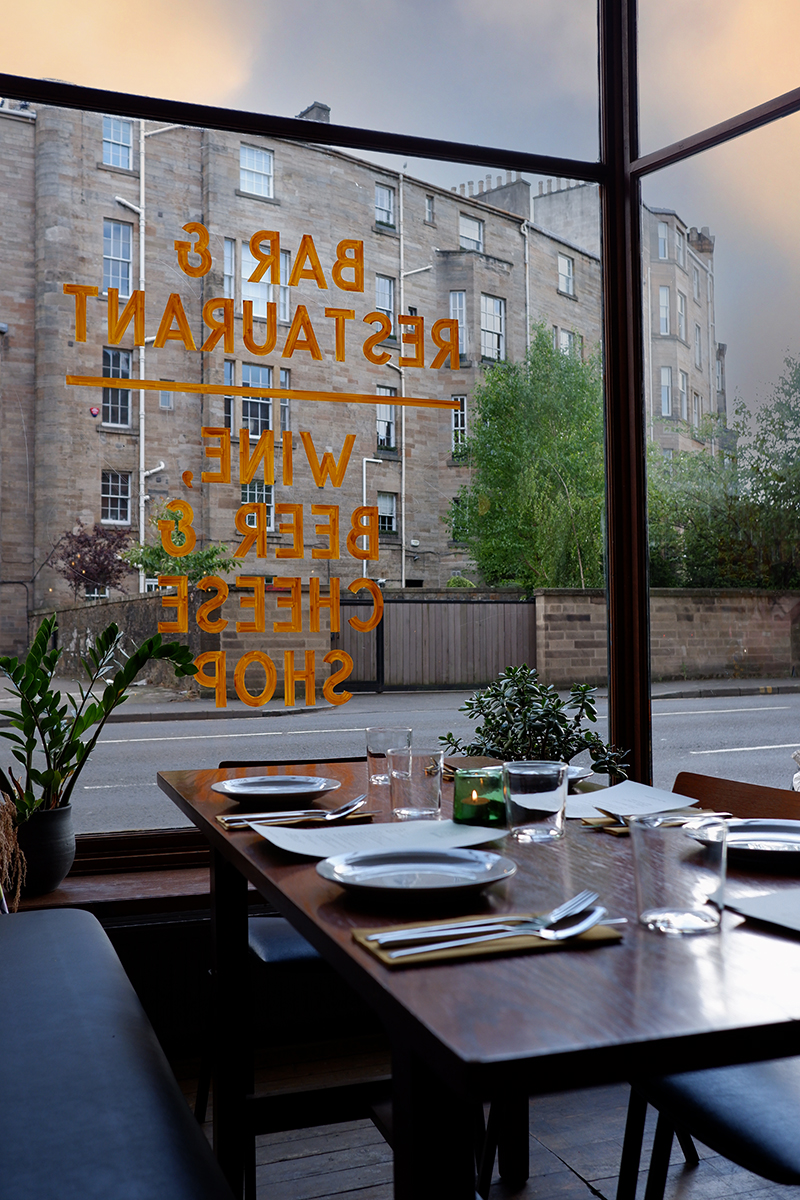 My favourite 8 bars and restaurants in Glasgow: Sylvan interior window and a table 