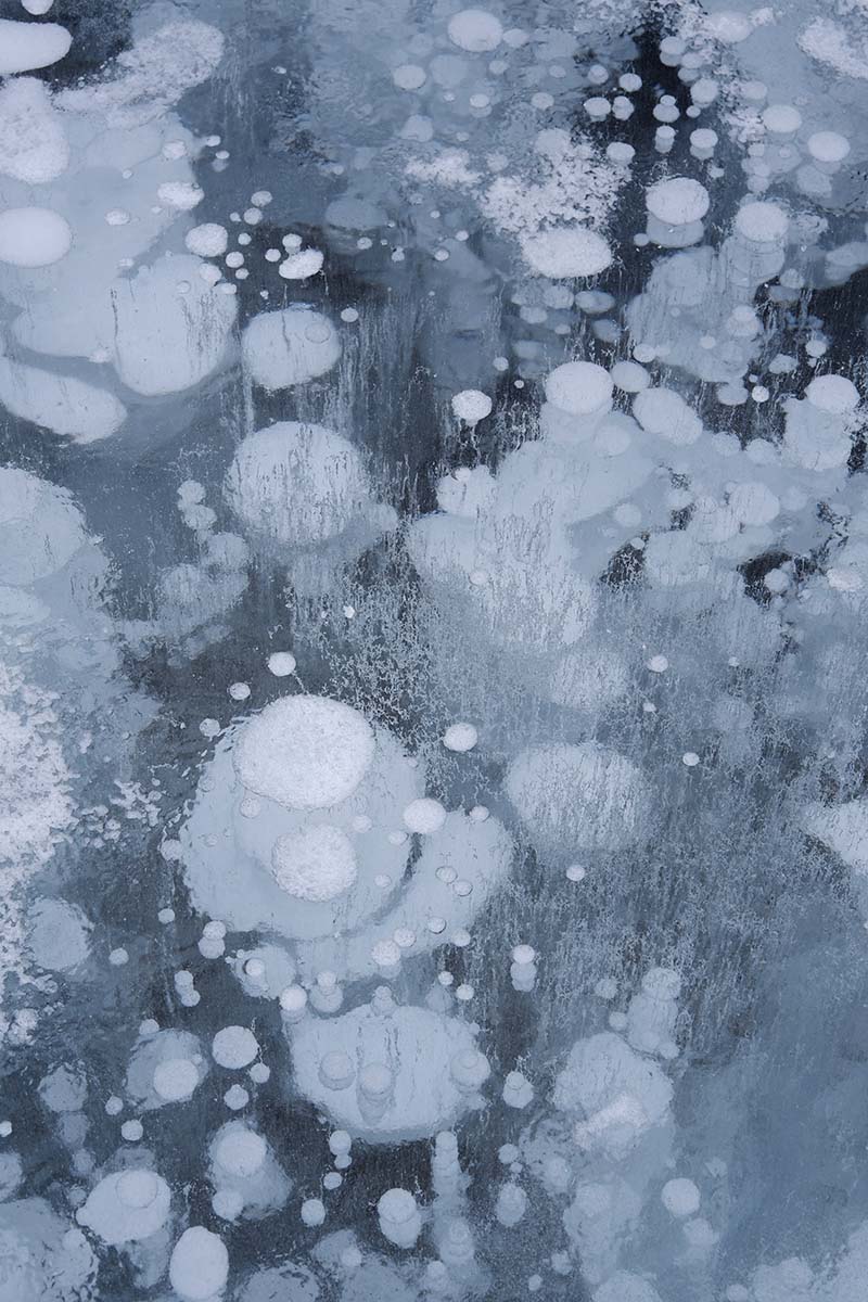 Five things to do in Banff for non-skiers: Abraham Lake close up on the ice with the bubbles