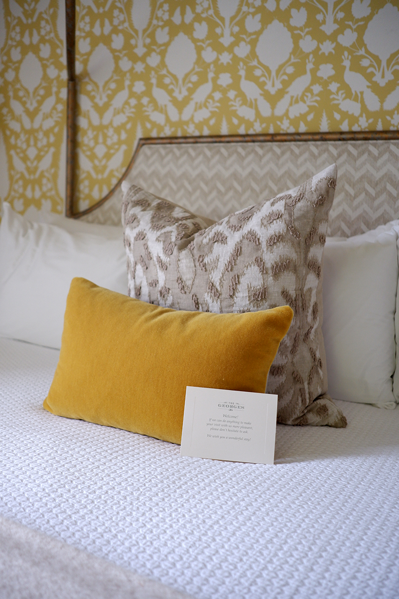 The Georges Historic Inn is a destination in Lexington: bedding with yellow pillows